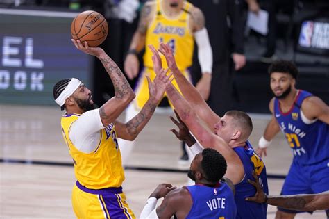 nuggets roll past lakers in game 3
